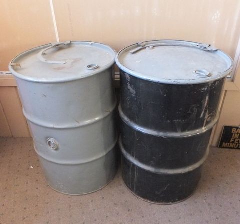 TWO 55-GALLON DRUMS WITH LIDS