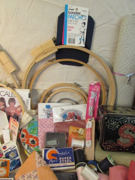 HUGE SEWING & EMBROIDERY LOT WITH VINTAGE CARPET BAG, SINGER TIN, FABRIC & MORE
