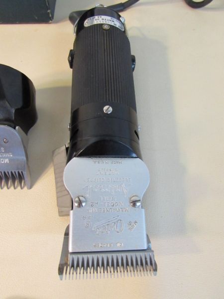 OSTER  ANIMAL CLIPPERS WITH MULTIPLE HEADS & BLADES 