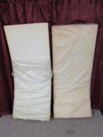 TWO SECTIONS OF FOAM FORMALLY USED FOR CAMP COT PADS