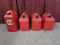 FOUR PLASTIC GAS CANS