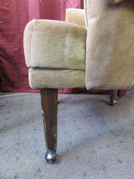 TWO UPHOLSTERED ROLLING DINING CHAIRS