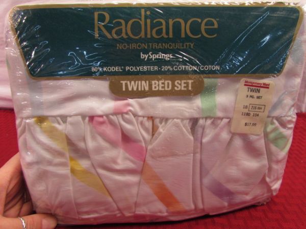 THREE NEVER USED SETS OF TWIN SIZE BED SHEETS