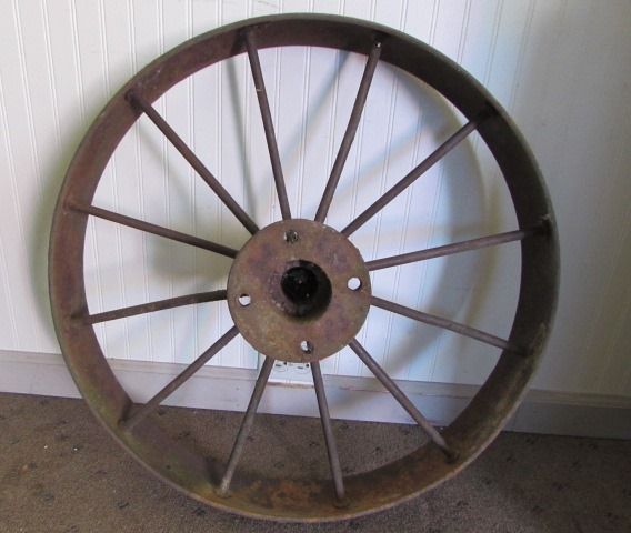 Lot Detail - ANTIQUE METAL WAGON WHEEL WITH 4" WIDE RIM