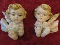 A PAIR OF PRETTY, VINTAGE BISQUE  WALL PLAQUES