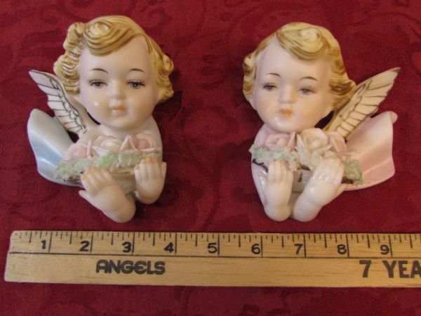 A PAIR OF PRETTY, VINTAGE BISQUE  WALL PLAQUES
