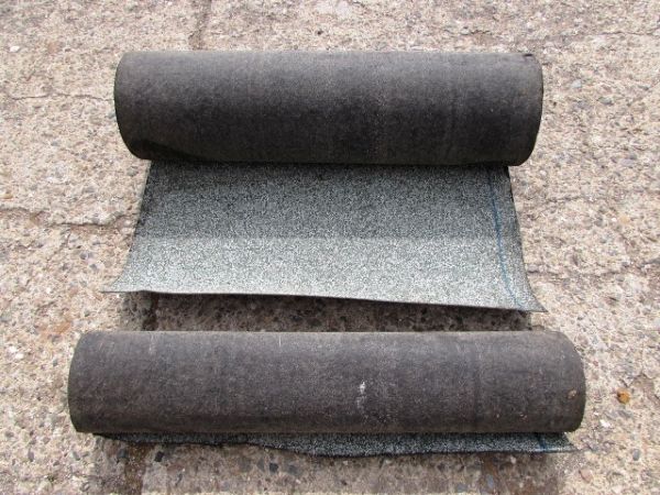 ONE & A PARTIAL ROLL OF 36 ROLL ROOFING