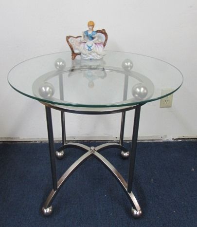 chrome side table round brushed glass pretty porcelain figurine