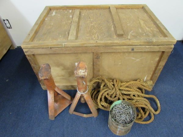 A LARGE WOODEN STORAGE BOX WITH NAILS, JACK STANDS & ROPE