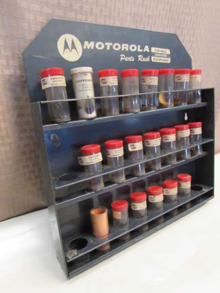 COOL METAL WALL RACK FOR THE SHOP - MOTOROLA PARTS RACK WITH CANISTERS & HARDWARE