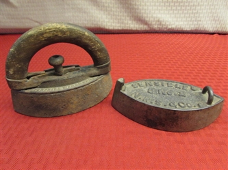 TWO ANTIQUE FLAT IRONS, ONE WITH WOOD HANDLE