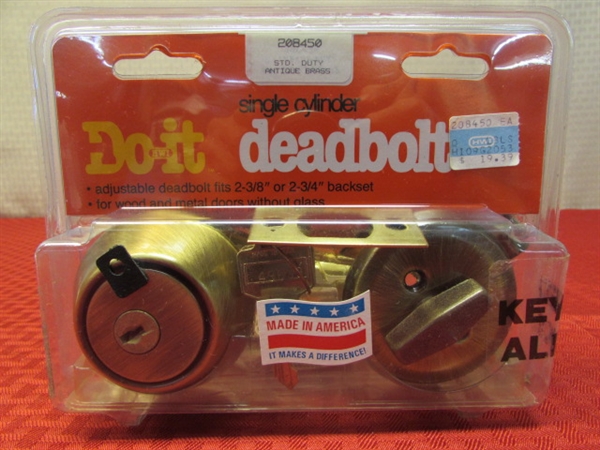 NEW IN THE BOX DEADBOLT & FIVE NEW IN THE BOX PASSAGE DOOR HANDLE KITS