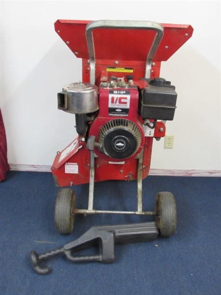 TROY BUILT 8 HP WOOD CHIPPER WITH A BRIGGS & STRATTON ENGINE 