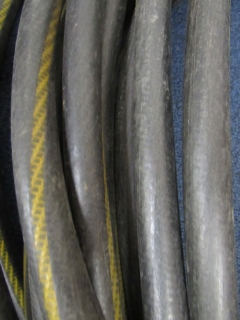 HEAVY DUTY BLACK GARDEN HOSE - YOU WILL BE NEEDING THIS IN JUST A COUPLE OF MONTHS.