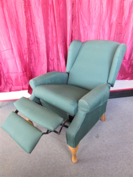 PUT YOUR FEET UP WHEN YOU RELAX IN THIS ELEGANT WINGBACK RECLINER