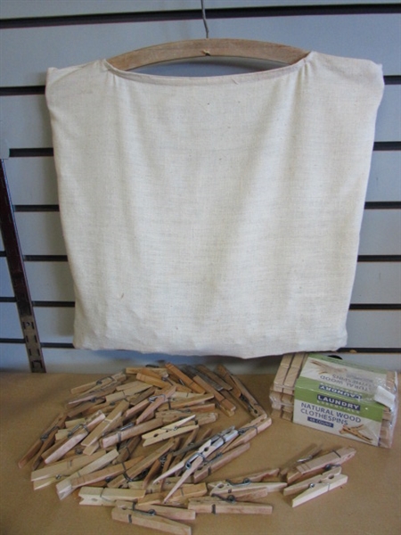 LOTS OF WOODEN CLOTHESPINS IN A NEAT VINTAGE BAG FOR HANGING ON THE CLOTHESLINE