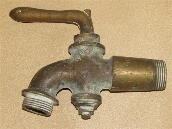A TRIO OF VINTAGE BRASS FAUCETS