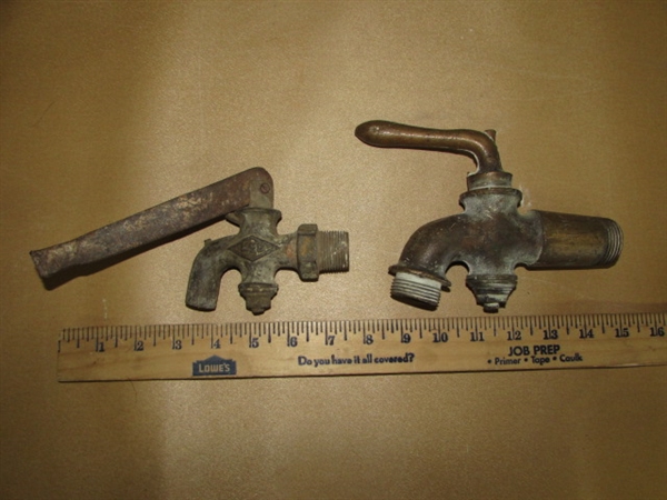 A TRIO OF VINTAGE BRASS FAUCETS