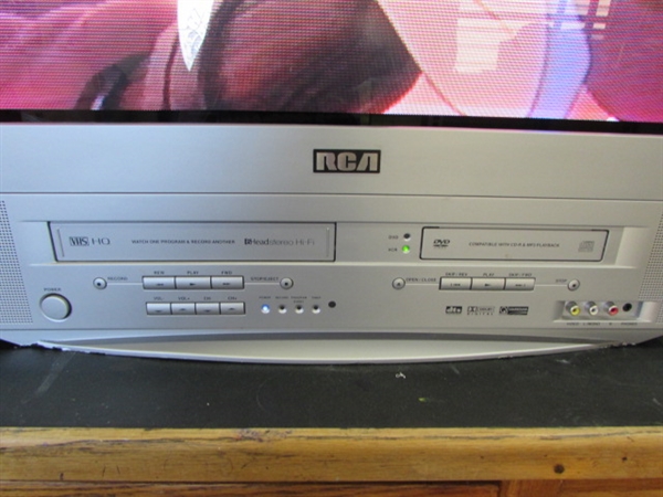 27 RCA TRUFLAT SCREEN TV W/BUILT IN VCR & DVD PLAYER