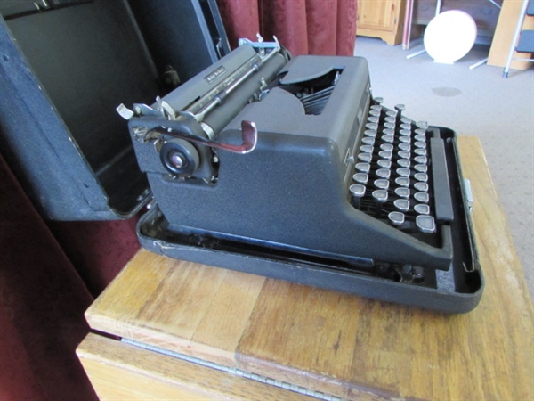 VINTAGE ROYAL TYPEWRITER WITH ROLLING TABLE