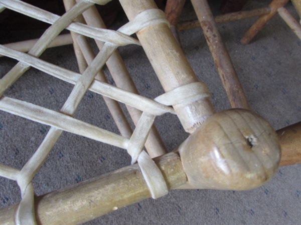 A PAIR OF PRIMITIVE WOOD/RAWHIDE SIDE CHAIRS