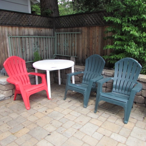 RESIN TABLE AND ADIRONDACK CHAIRS
