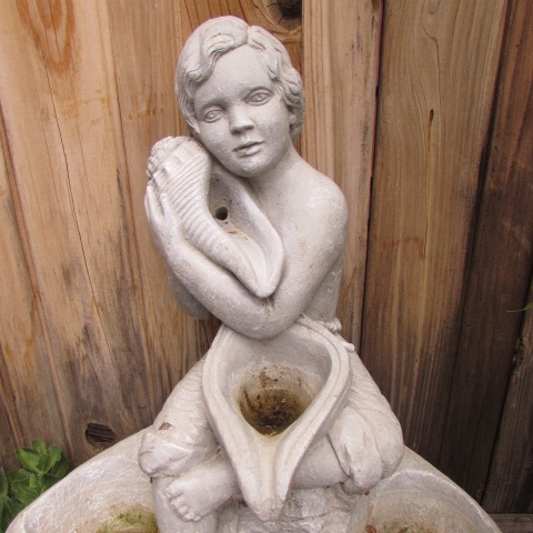 CONCRETE WATER FOUNTAIN WITH CHILD