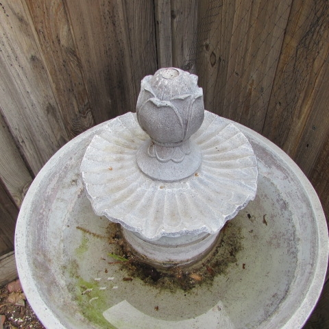 CONCRETE WATER FOUNTAIN WITH FLOWER