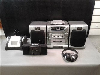Radio, CD player, Boynq Ipod player, and Headphones 