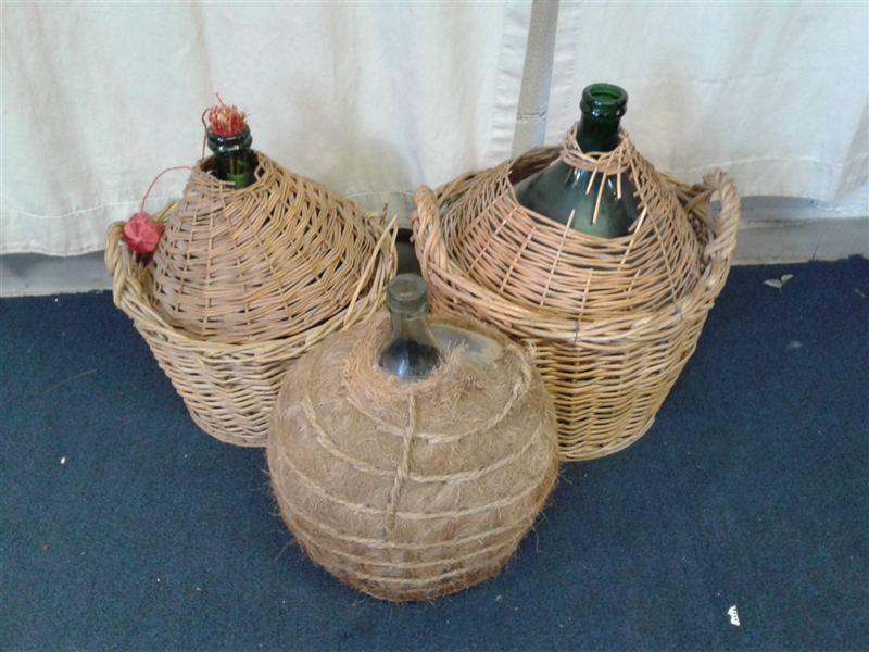 3 Vintage Demijohn's In Baskets
