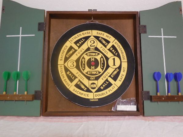 NEARLY NEW WALL MOUNT DART BOARD IN CABINET