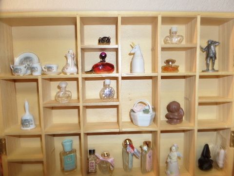 GLASS FRONTED CURIO CABINET WITH PERFUME BOTTLES, MINI TEA SET AND MORE
