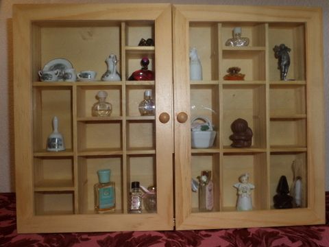 GLASS FRONTED CURIO CABINET WITH PERFUME BOTTLES, MINI TEA SET AND MORE