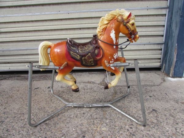 old rocking horse with springs