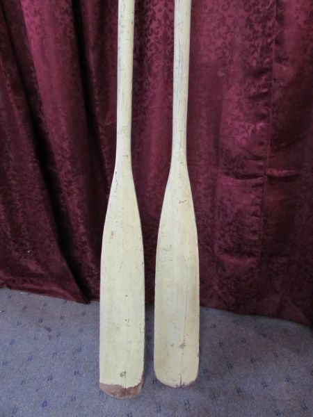 YELLOW WOODEN BOAT OARS