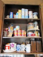 CANNED GOODS & COFFEE CUPBOARD  W/SILVER PLATE SPOONS & 