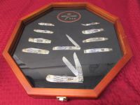 SET OF 10 MUSTANG KNIVES IN A WOOD WITH  GLASS FRONT DISPLAY CASE & COA