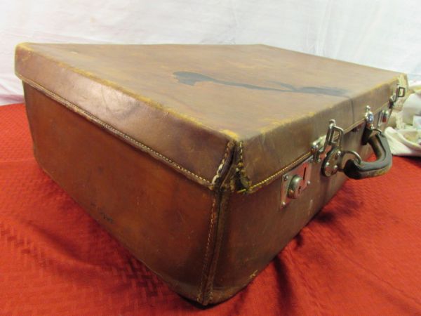 LARGE VINTAGE LEATHER SUITCASE WITH VINTAGE LINENS