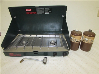 VERY NICE COLEMAN PROPANE CAMPING STOVE WITH TWO PROPANE FUEL CANISTERS