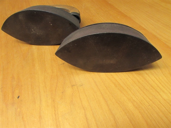 TWO ANTIQUE FLAT IRONS, ONE WITH WOODEN HANDLE