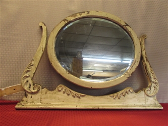 BEAUTIFUL ANTIQUE OVAL BEVELED MIRROR IN TILT FRAME WITH ORNATE CARVED LEAVES