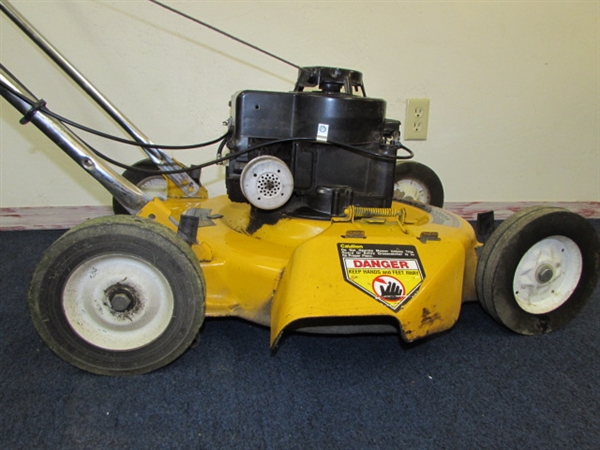 YELLOW LAWN MOWER U.S.A. MADE BY MTD PRODUCTS