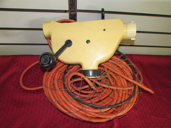 WONDER WINDER WITH A VERY LONG EXTENSION CORD