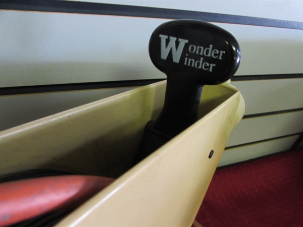 WONDER WINDER WITH A VERY LONG EXTENSION CORD