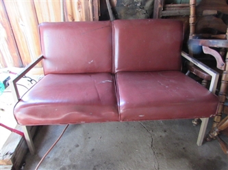 MID-CENTURY NAUGAHYDE LOVE SEAT