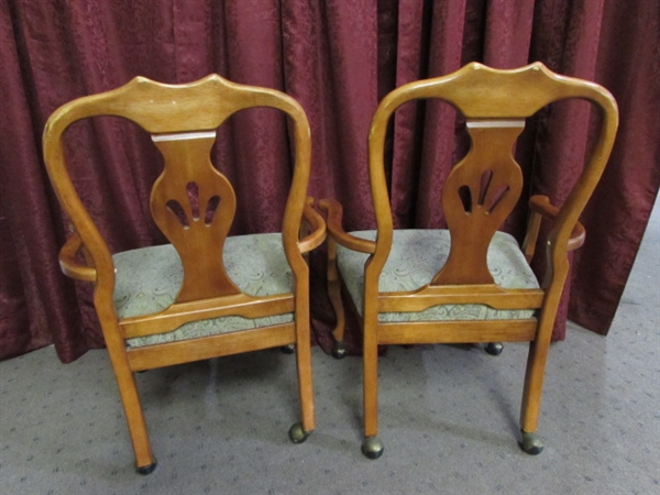 ANOTHER PAIR OF ROLLING DINING ROOM CHAIRS