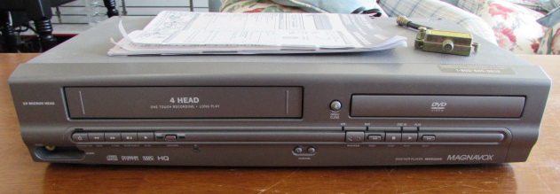 Lot Detail - MAGNAVOX DVD/VCR PLAYER AND MOVIES