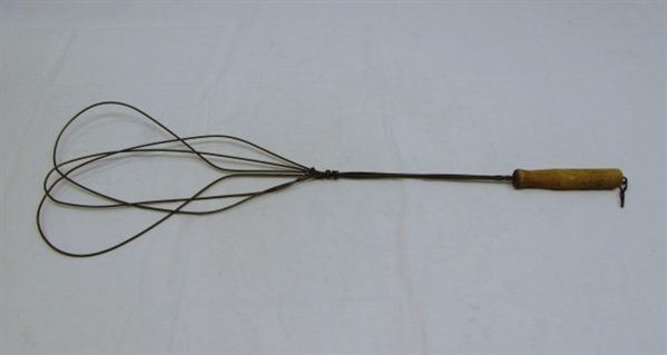 ANTIQUE RUG BEATER