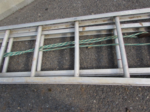 VERY LONG ALUMINUM EXTENSION LADDER
