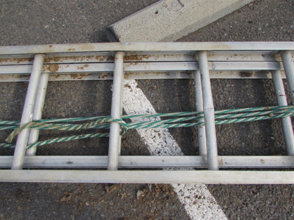 VERY LONG ALUMINUM EXTENSION LADDER